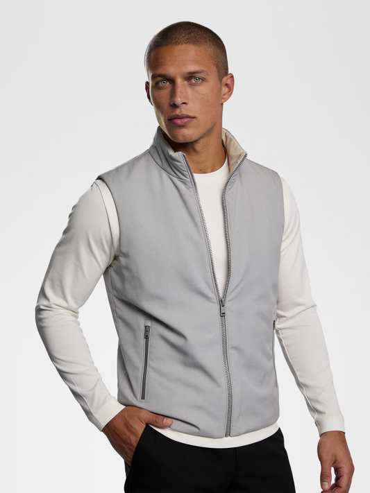 black urbanpants, white long sleeve, lp black shoe, grey engineered gilet — lightskin_model — Close Front