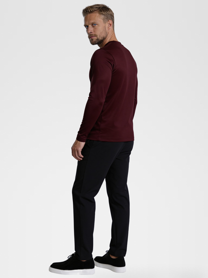 burgundy long sleeve, black urbanpants, black shoe — blond_model — 3/4 Side